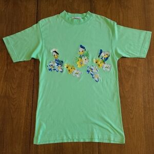 1992 Super soft lime green Donald Duck t-shirt by Iceberg designer Disney vtg